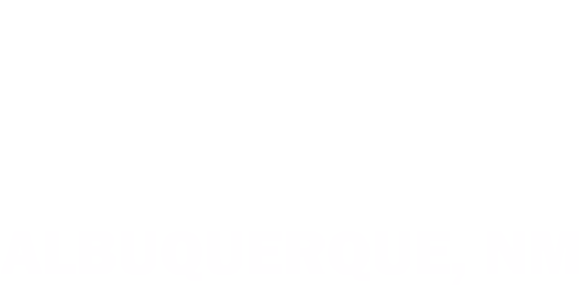 Underlined uppercase text "ALBUQUERQUE, NM" appears centered at the image's lower edge, white letters with a black drop shadow on a plain white background.